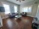Cozy living room with two sofas, hardwood floors, and plenty of natural light from the bright windows at 726 E Mccarty St, Indianapolis, IN 46203