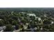 Discover a serene neighborhood with lush greenery, a tranquil lake, and inviting community spaces at 7971 Clearwater Ct, Indianapolis, IN 46256