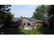 Relax on this spacious back deck with well-manicured landscaping and a charming pergola, perfect for outdoor entertaining at 7971 Clearwater Ct, Indianapolis, IN 46256