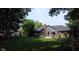 Enjoy the peaceful serenity and expansive backyard in a home featuring a deck, mature trees and landscaping at 7971 Clearwater Ct, Indianapolis, IN 46256