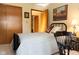 Bedroom with door to hallway and closet door at 7971 Clearwater Ct, Indianapolis, IN 46256