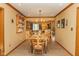 Bright dining room with a wooden table set for six, plus decorative accents at 7971 Clearwater Ct, Indianapolis, IN 46256