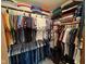 Spacious walk-in closet with custom built-in shelving for ample storage at 7971 Clearwater Ct, Indianapolis, IN 46256