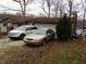 The home has a large driveway leading to a two car garage at 8 Lake Hart, Mooresville, IN 46158