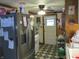 The kitchen features stainless steel appliances, decorative floors, and a ceiling fan at 8 Lake Hart, Mooresville, IN 46158
