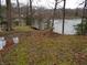 Lush greenery with a tranquil lake view, showcasing the natural beauty at 8 Lake Hart, Mooresville, IN 46158