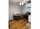 Cozy kitchen featuring a dining table and modern appliances at 8833 Crawfordsville Rd, Indianapolis, IN 46234