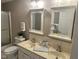 Bathroom with dual sinks, shower and lots of natural light at 8960 Stepping Stone Way, Avon, IN 46123