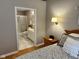 Bedroom leading to bathroom featuring shower, toilet, sink and bright light at 8960 Stepping Stone Way, Avon, IN 46123