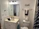 Bathroom featuring a vanity with marble countertop and blue patterned shower curtain at 8960 Stepping Stone Way, Avon, IN 46123