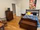 Spacious bedroom with wood floor and decor at 8960 Stepping Stone Way, Avon, IN 46123