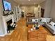 Comfortable living room with a fireplace, television, and dining area at 8960 Stepping Stone Way, Avon, IN 46123