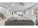 Basement home theater room featuring a large projection screen, comfortable seating, and a projector at 10802 Giselle Way, Fishers, IN 46040