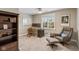 Bedroom/office with natural light, carpeted floors, and built-in shelving at 10802 Giselle Way, Fishers, IN 46040
