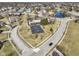 Aerial view of a community park featuring a basketball court, green spaces, and well-maintained landscaping at 12396 Dellfield W Blvd, Carmel, IN 46033