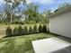 Spacious backyard with lush green lawn and freshly planted trees for added privacy at 14383 Coyote Ridge Dr, Noblesville, IN 46060