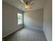 Bedroom features carpet, a window, and a ceiling fan at 14383 Coyote Ridge Dr, Noblesville, IN 46060