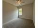 Bedroom features carpet, a window, and a ceiling fan at 14383 Coyote Ridge Dr, Noblesville, IN 46060