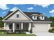 Charming single-Gathering home showcasing a traditional design with a two-car garage and well-manicured lawn at 14383 Coyote Ridge Dr, Noblesville, IN 46060