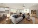 Bright, modern living room with ample natural light, stylish furniture, and an open floor plan at 14383 Coyote Ridge Dr, Noblesville, IN 46060