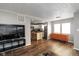 Spacious living area with hardwood floors, featuring an open layout connecting to the kitchen at 1459 E Lynn Dr, Indianapolis, IN 46202