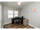 Bright home office space with desk, rolling chair, and modern decor at 1459 E Lynn Dr, Indianapolis, IN 46202