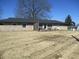 Spacious backyard features a well-manicured lawn, perfect for outdoor activities and relaxation at 1459 S Josephine St, Martinsville, IN 46151