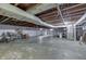An unfinished basement with exposed ceiling and concrete floor at 1459 S Josephine St, Martinsville, IN 46151