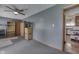 A bedroom with hardwood doorways, carpet and a ceiling fan at 1459 S Josephine St, Martinsville, IN 46151
