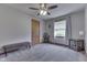 An airy bedroom with large window, neutral paint, and carpet at 1459 S Josephine St, Martinsville, IN 46151