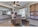 A dining area with a window view and an open kitchen at 1459 S Josephine St, Martinsville, IN 46151