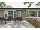 Charming covered front porch featuring comfortable seating and decorative floral accents at 1459 S Josephine St, Martinsville, IN 46151