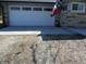 Attached garage featuring a new concrete driveway and a contemporary design at 1459 S Josephine St, Martinsville, IN 46151