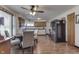 Traditional eat-in kitchen featuring wood cabinets, stainless steel appliances, and a ceiling fan at 1459 S Josephine St, Martinsville, IN 46151