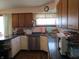 Functional kitchen with plentiful countertop space, light and dark cabinets, and hardwood flooring at 1459 S Josephine St, Martinsville, IN 46151