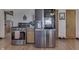 Contemporary kitchen boasting stainless steel appliances and wood cabinetry at 1459 S Josephine St, Martinsville, IN 46151