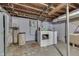 Basement laundry room with washer, dryer, and utility sink at 1459 S Josephine St, Martinsville, IN 46151