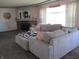 Inviting living room featuring a comfortable sectional sofa, fireplace, and natural light, great for relaxation at 1459 S Josephine St, Martinsville, IN 46151