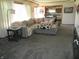 Comfortable living room featuring a stylish sectional sofa and abundant natural light at 1459 S Josephine St, Martinsville, IN 46151