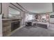 Bright living room with a stone fireplace, plush seating, and an open layout at 1459 S Josephine St, Martinsville, IN 46151