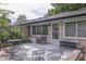 Cozy outdoor patio with comfortable seating, perfect for relaxing and entertaining at 1459 S Josephine St, Martinsville, IN 46151