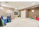 Finished basement area with neutral paint, carpet, and good lighting at 14936 Newport Dr, Westfield, IN 46074