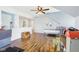 Bonus room with plenty of space, natural light, ceiling fan, and hardwood flooring at 14936 Newport Dr, Westfield, IN 46074