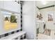 Laundry room with tile floors, white cabinets, window, and laundry machine at 14936 Newport Dr, Westfield, IN 46074