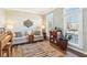 Cozy living room with neutral walls, wood floors, and ample natural light streaming through large windows at 14936 Newport Dr, Westfield, IN 46074