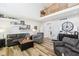 Bright living room boasts hardwood floors, neutral paint, and direct access to the second floor at 14936 Newport Dr, Westfield, IN 46074