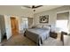 Spacious bedroom with neutral decor and ceiling fan; a relaxing retreat at 1505 S Alabama St, Indianapolis, IN 46225