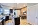 Stylish kitchen with a center island, brick accents, and contemporary lighting at 1505 S Alabama St, Indianapolis, IN 46225