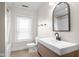 Updated bathroom showcasing a modern sink, vanity, toilet, and a stylish mirror at 1714 Elm St, Columbus, IN 47201