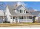 Charming two-story home with a welcoming porch and classic architectural details at 1714 Elm St, Columbus, IN 47201
